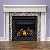 Cozy fireplace with burning logs